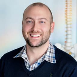 Dr. Matthew Serrick, chiropractor and owner of BACK IN BALANCE Clinic
