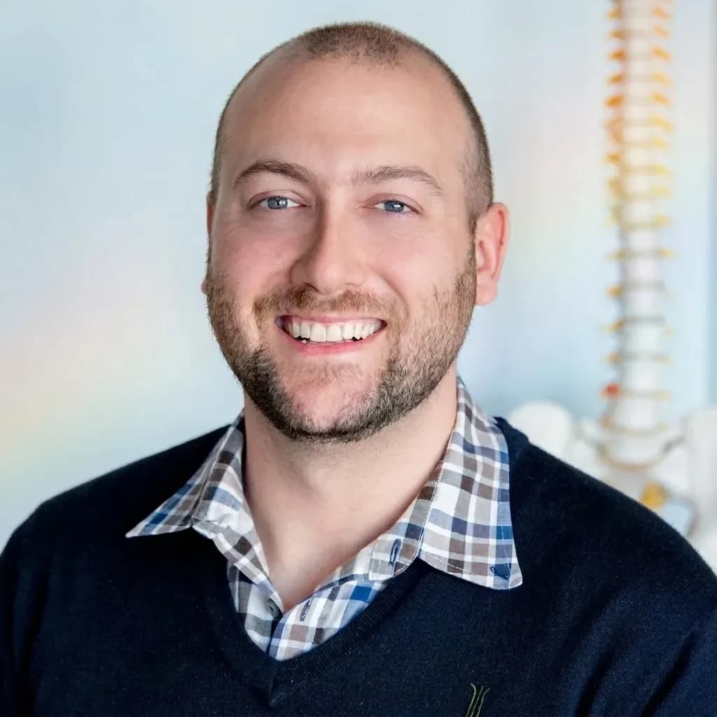 Dr. Matthew Serrick, chiropractor and owner of BACK IN BALANCE Clinic