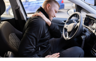 Man with neck pain whiplash after car accident